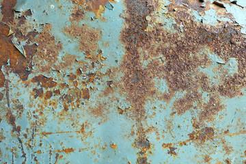 Old cracked paint pattern on rusty background