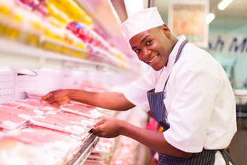 african butcher working in butchery