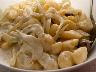 Italian potato Gnocchi pasta with cheese sauce and mushrooms