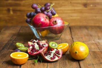 Naklejka na ściany i meble fruit mix on a wooden background