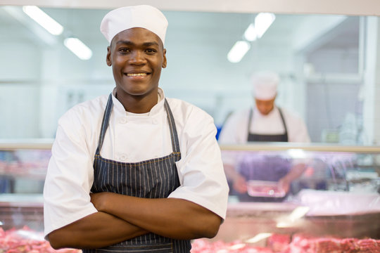 afro american butcher arms folded