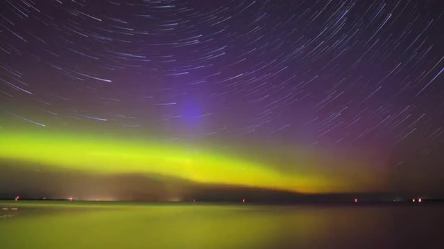4k time lapse video clip of aurora and star trails in night sky in Ontario, Canada