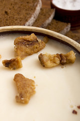 Fat of the lard in a ceramic dish