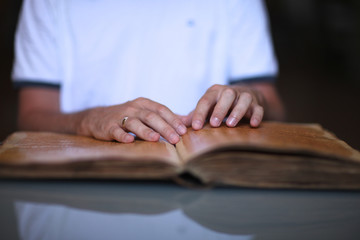 Blind person reading a book