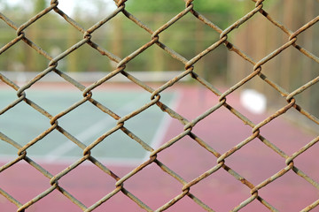 Fototapeta premium cage of blurred tennis court