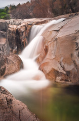 Fototapeta na wymiar Small waterfall in SIerra de Guadarrama National Park II