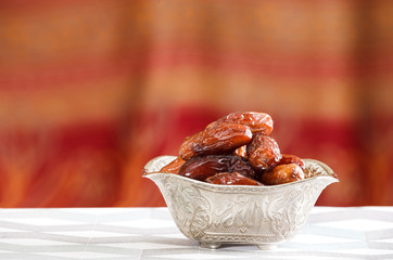 Beautiful bowl full of date fruits symbolizing Ramadan
