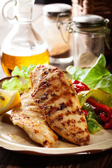 Grilled chicken breasts served with grilled paprika
