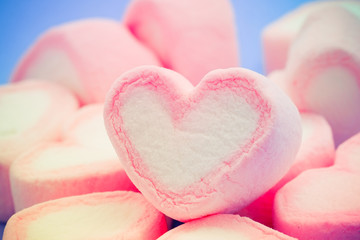 Fototapeta premium Pink heart shape of marshmallow with filter effect retro vintage