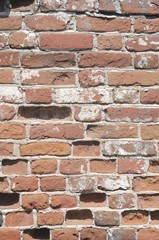 Fototapeta premium Old red cracked brick wall. Abstract background
