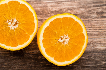 Orange slice on the grey  background.