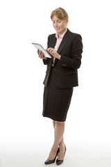 Business woman using a tablet computer