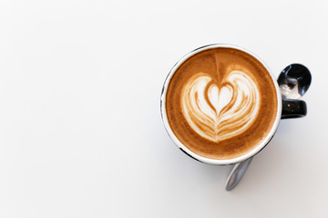 Hot art Latte Coffee in the table
