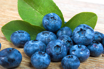 blueberries on a wooden background
