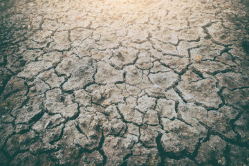 dried and cracked ground soil texture with vintage style effect