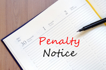 Penalty notice write on notebook