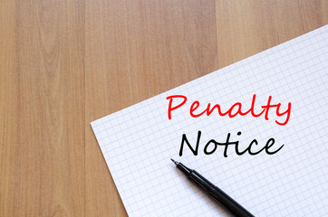 Penalty notice write on notebook