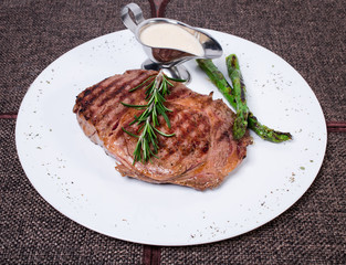 Delicious beef steak with grilled asparagus.