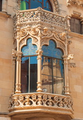 Beautiful old balcony - a sample of ancient European architecture