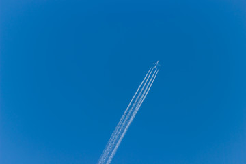Airplane on the sky. An airplane trail across the sky