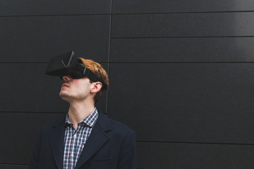 Young man with virtual reality headset
