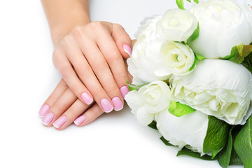 Woman hands with french manicure