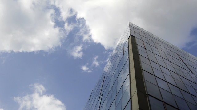 Time lapse: modern architecture, sky, clouds and copy space.