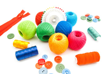 thread, pins, zipper and buttons