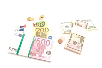 packs of euro and dollars banknotes and coins