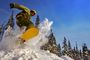 Snowboarder jumping