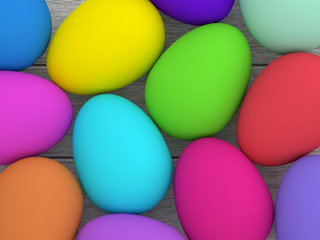 Fototapeta na wymiar Easter eggs lying on wooden desk