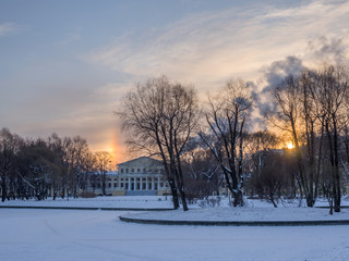 St. Petersburg in the winter. The Yusupov Palace on the Fontanka in the frosty sunny morning - view from the Yusupov Park. Sunny parhelion - frosty rainbow