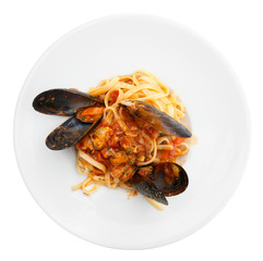 Fried mussels with pasta isolated on white