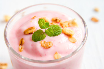 strawberry yogurt with granola and mint