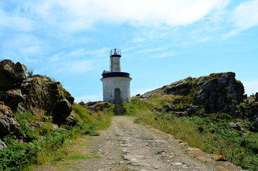Fototapeta na wymiar Small lighthouse on the Faro island (Islas Cies, Galicia, Spain) 