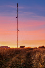 Carpathian Mountains. Sunset repeater on the hill