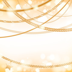 Golden chains on light glow background.