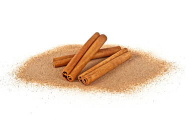 Cinnamon sticks with powder isolated on white background