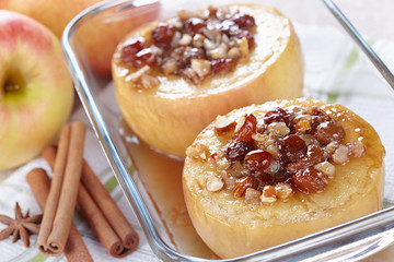 Apples baked with honey, nuts and raisins