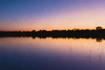 sunset at coast of the lake