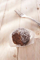 sweet and delicious chocolate balls with coconut flakes 