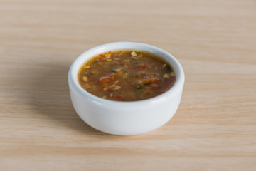 Thai Cuisine, Thai spicy sauce on wooden background