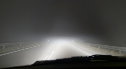 First person view of driving in heavy fog at night