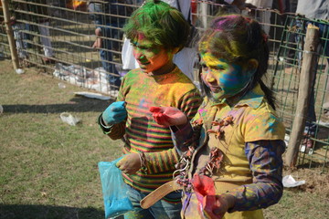 Shantiniketan, West Bengal, India- March 5, color festival of India on 5th March, 2015. Child are enjoying Holi at Shantiniketan, the abode of Rabindranath Tagore.