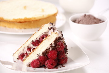 tasty sponge cake with raspberries 