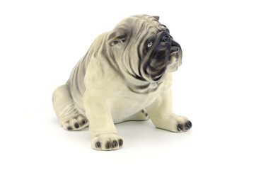 Statuette of dog  isolated on white background