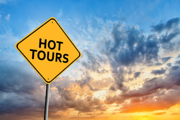 Sunset and yellow sign