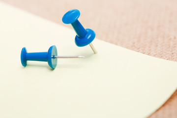 Adhesive note and pushpins