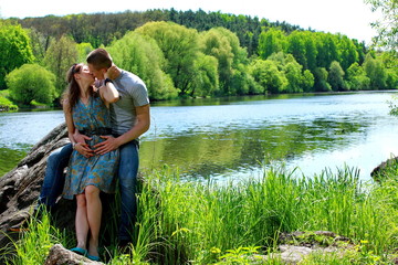 Summer love. Loving couple. Two lovers in nature. Appointment of a young couple on nature - Stock image