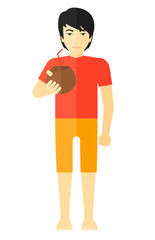 Man drinking cocktail.